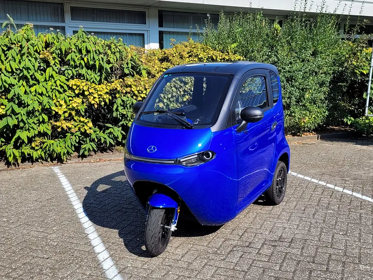 groene trike jdm invalidenvoertuig city