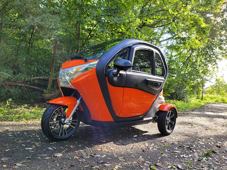 groene trike jdm invalidenvoertuig city